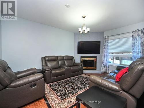 6136 Ford Road, Mississauga, ON - Indoor Photo Showing Living Room With Fireplace