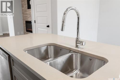 3160 Green Turtle Road, Regina, SK - Indoor Photo Showing Kitchen With Double Sink