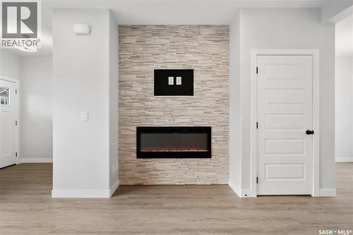 3160 Green Turtle Road, Regina, SK - Indoor With Fireplace