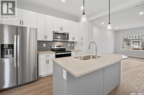 3160 Green Turtle Road, Regina, SK - Indoor Photo Showing Kitchen With Double Sink With Upgraded Kitchen