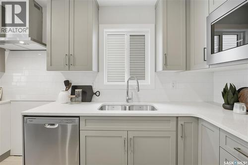 8657 Wheat Crescent, Regina, SK - Indoor Photo Showing Kitchen With Double Sink