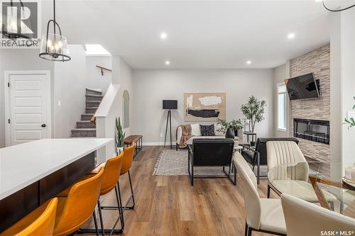 323 Asokan Bend, Saskatoon, SK - Indoor Photo Showing Other Room With Fireplace