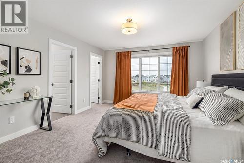 323 Asokan Bend, Saskatoon, SK - Indoor Photo Showing Bedroom
