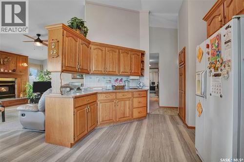 302 6Th Street, Hague, SK - Indoor Photo Showing Kitchen With Fireplace