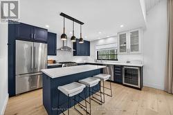 Stainless appliances, breakfast bar island - 