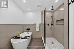 Primary Ensuite has glass shower & soaker tub - 