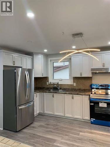 35 Folkestone Avenue Unit# Upper, Hamilton, ON - Indoor Photo Showing Kitchen With Double Sink