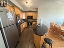 307 615 Saskatchewan Crescent W, Saskatoon, SK  - Indoor Photo Showing Kitchen With Stainless Steel Kitchen 