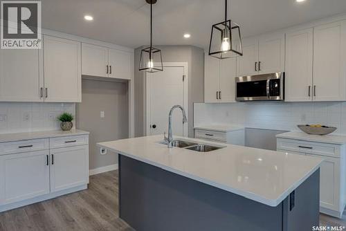 322 Asokan Bend, Saskatoon, SK - Indoor Photo Showing Kitchen With Double Sink