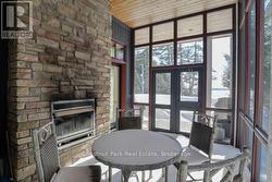 Screened Muskoka Room with Fireplace - 