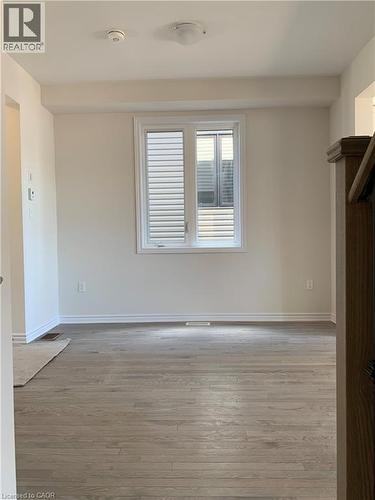 Empty room with light wood-style floors - 49 Eberhardt Drive, Wasaga Beach, ON - Indoor Photo Showing Other Room