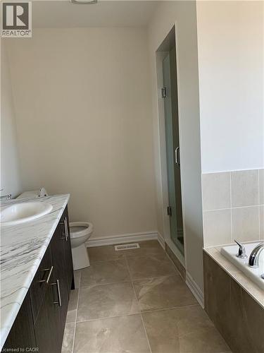 Full bathroom with vanity, a shower stall, and a garden tub - 49 Eberhardt Drive, Wasaga Beach, ON - Indoor Photo Showing Bathroom