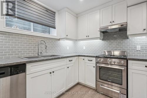 100 Harris Crescent, Southgate, ON - Indoor Photo Showing Kitchen With Double Sink With Upgraded Kitchen