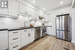 Stylish Kitchen Boasts a Subway Tile Backsplash - 