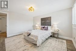 The Primary Bedroom Features a Walk-In Closet - 