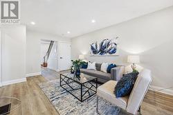 Living Room with a French Door Walkout to Backyard - 