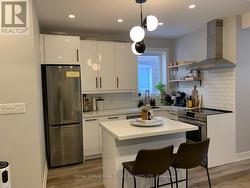 MAIN - 163 HIGH PARK AVENUE  Toronto, ON M6P 2S3