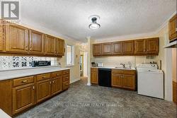 Kitchen with island removed. - 