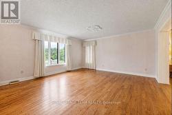 Furniture Removed from room showing HW floors. - 