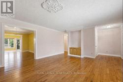 Looking into dining room with furniture removed. - 