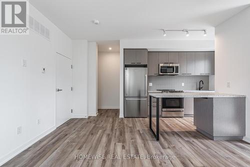 Th8 - 20 Ed Clark Gardens, Toronto, ON - Indoor Photo Showing Kitchen With Stainless Steel Kitchen