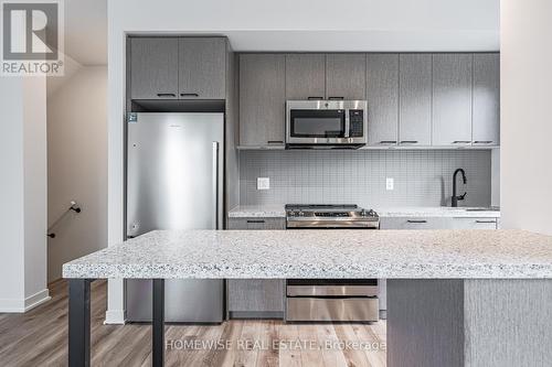 Th8 - 20 Ed Clark Gardens, Toronto, ON - Indoor Photo Showing Kitchen With Stainless Steel Kitchen With Upgraded Kitchen