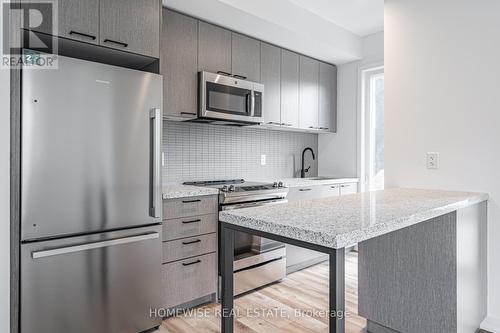 Th8 - 20 Ed Clark Gardens, Toronto, ON - Indoor Photo Showing Kitchen With Stainless Steel Kitchen With Upgraded Kitchen