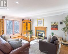 Family Room with a Cozy Woodburning Fireplace - 