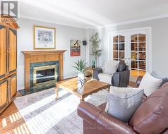 Family Room with a Cozy Woodburning Fireplace - 