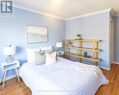 Spacious Bedroom with Laminate Flooring - 