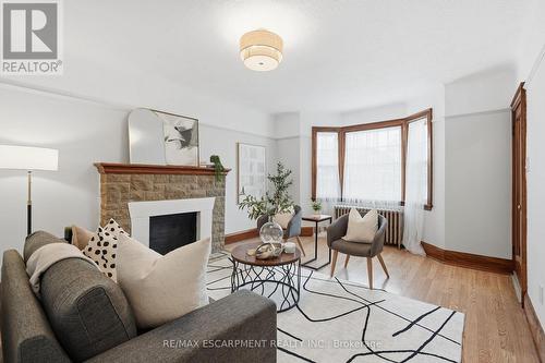 48 Weir Street N, Hamilton, ON - Indoor Photo Showing Living Room With Fireplace