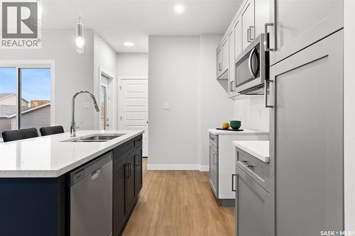 3136 Green Turtle Road, Regina, SK - Indoor Photo Showing Kitchen With Double Sink With Upgraded Kitchen