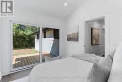 Primary Bedroom Looking onto the Large Deck. - 