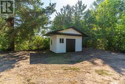 Large Shed with Double Doors and Overhangs. - 