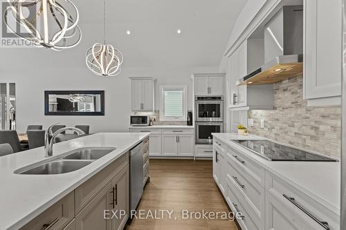 Kitchen with built-in double oven - 3571 Whispering Woods Trail, Fort Erie (Ridgeway), ON - Indoor Photo Showing Kitchen With Double Sink With Upgraded Kitchen