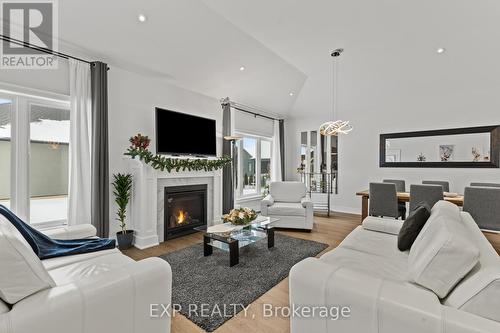 Living Room with gas Fireplace - 3571 Whispering Woods Trail, Fort Erie (Ridgeway), ON - Indoor Photo Showing Living Room With Fireplace