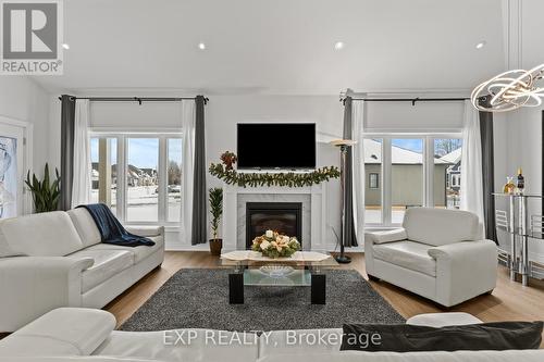 Living Room with gas Fireplace - 3571 Whispering Woods Trail, Fort Erie (Ridgeway), ON - Indoor Photo Showing Living Room With Fireplace