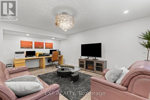 Basement Family Room with Office space - 3571 Whispering Woods Trail, Fort Erie (Ridgeway), ON - Indoor Photo Showing Living Room