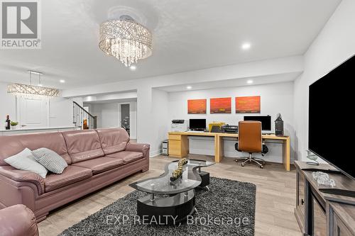 Basement Family Room with Office space - 3571 Whispering Woods Trail, Fort Erie (Ridgeway), ON - Indoor Photo Showing Living Room