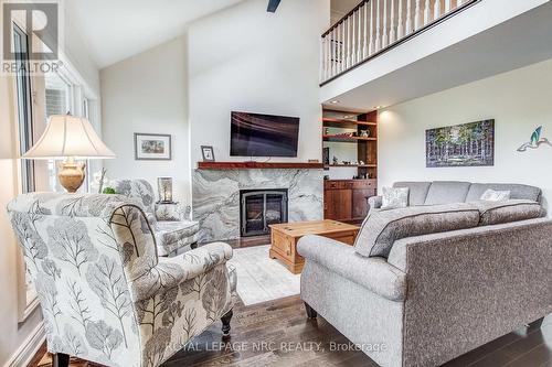645 Clarence Street, Port Colborne (Sugarloaf), ON - Indoor Photo Showing Living Room With Fireplace