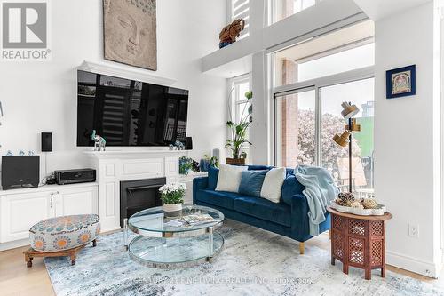 Th22 - 6 Pirandello Street, Toronto, ON - Indoor Photo Showing Living Room With Fireplace
