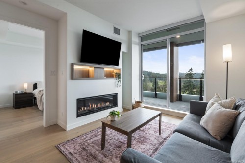 1012-2000 Hannington Rd, Langford, BC - Indoor Photo Showing Living Room With Fireplace