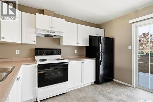 2748 Cranbourn Crescent, Regina, SK - Indoor Photo Showing Kitchen With Double Sink