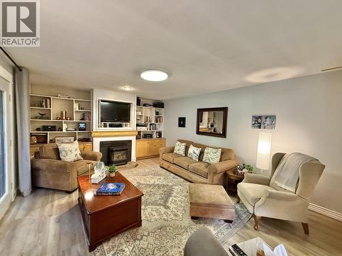 108 Lawlor Drive, Quesnel, BC - Indoor Photo Showing Living Room With Fireplace