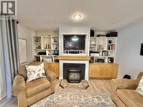 108 Lawlor Drive, Quesnel, BC - Indoor Photo Showing Living Room With Fireplace
