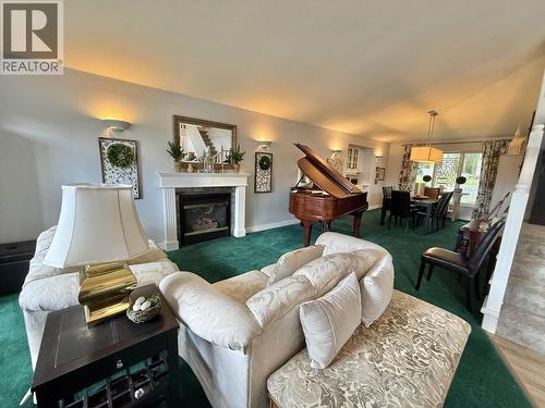 108 Lawlor Drive, Quesnel, BC - Indoor Photo Showing Living Room With Fireplace