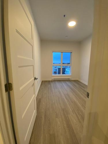 Chambre à coucher - 402-4325 Rue Des Dirigeables, Longueuil (Saint-Hubert), QC - Indoor Photo Showing Other Room