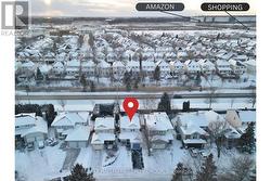 Aerial view of front and neighbourhood - 