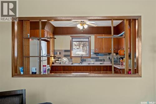 87 Robinson Crescent, Regina, SK - Indoor Photo Showing Kitchen With Double Sink
