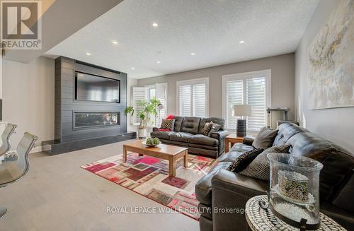 43 Greyhawk Street, Kitchener, ON - Indoor Photo Showing Living Room With Fireplace